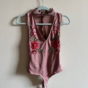 Revamped pink body suit with neck cuff and beautiful lace and flower details